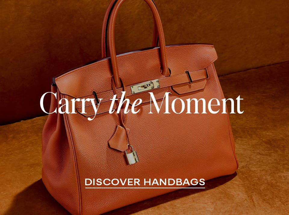 orange Hermes Birkin bag in glowing light