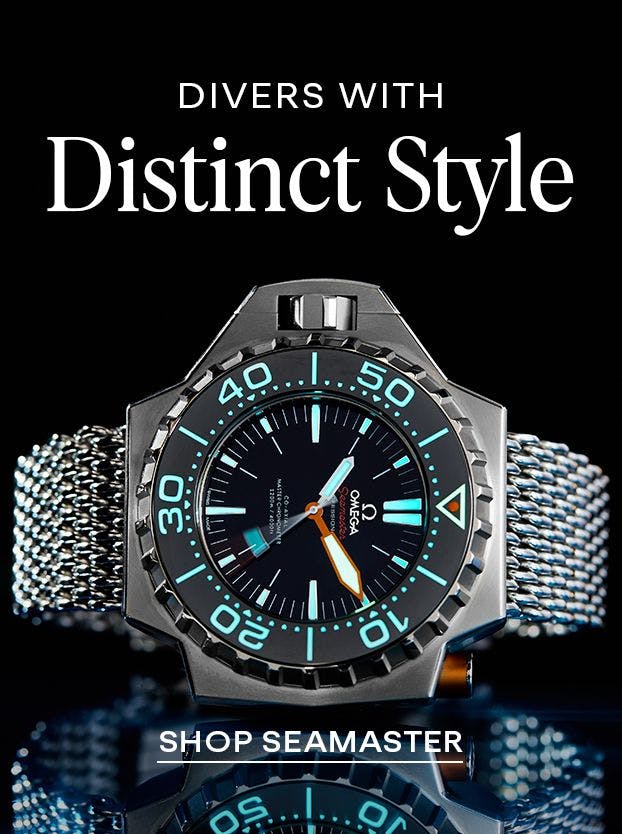 close-up of pre-owned omega seamaster against black background showcasing its lume dial 