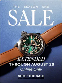 The Season End Sale - up to 45% off through August 23, model wearing a Breitling chronograph watch against a blue sky background