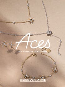 Gold and diamond jewelry from "Aces by Paula Badosa" reflecting strength and resilience, exclusively at The 1916 Company.