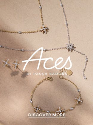 Gold and diamond jewelry from "Aces by Paula Badosa" reflecting strength and resilience, exclusively at The 1916 Company.