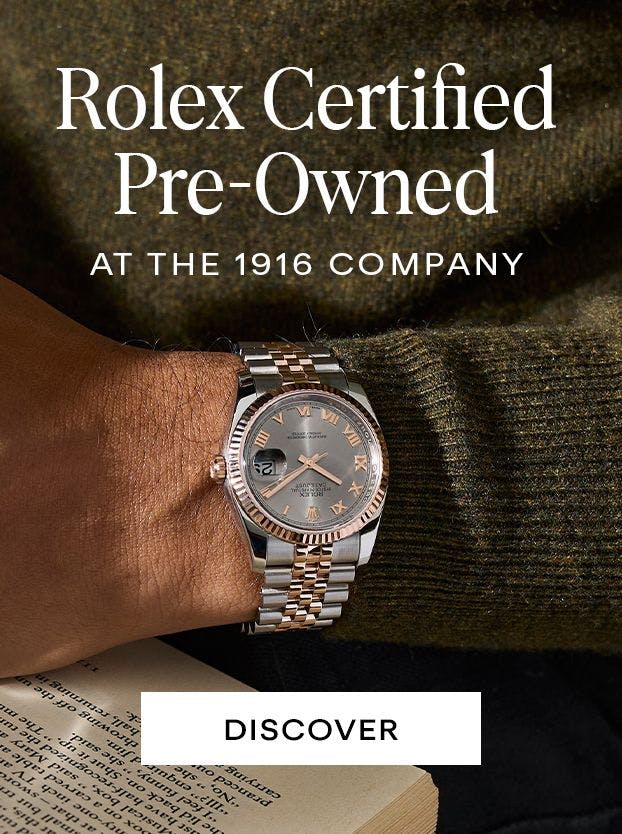 A close-up shot of a wrist adorned with a stunning, Rolex Certified Pre-Owned watch from The 1916 Company, exuding timeless elegance and sophistication. T