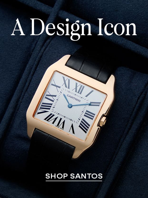 A close-up of a rose gold Cartier Santos watch with a square white dial, Roman numerals, and blue hands, on a black leather strap, set against a dark blue background